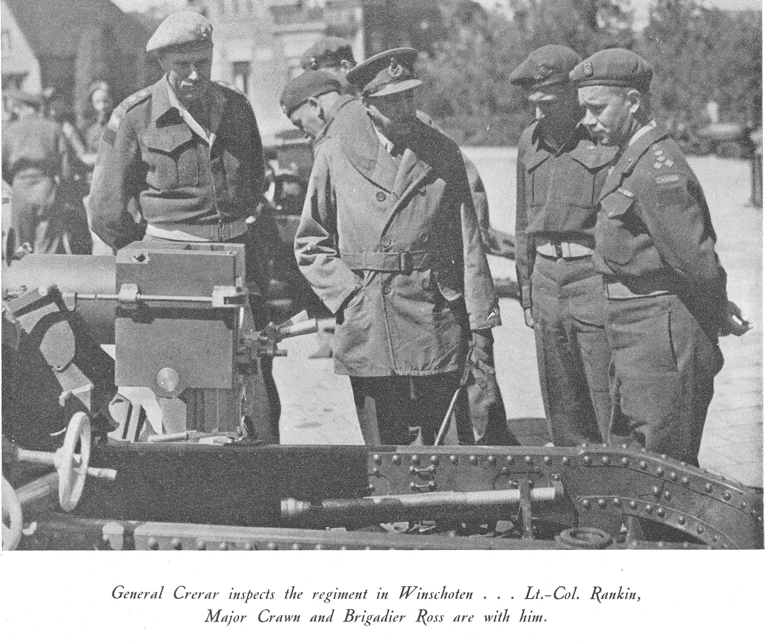 Rankin, Crerar, Crown and Ross inspect an artillery gun